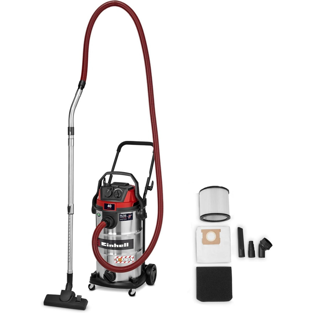 Aspirateur pour liquides et poussieres avec une prise en main par poignee et le deplacement sur roulettes